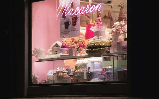 A pink neon sign in a window with a pink light from Chrome web store to be run with OffiDocs Chromium online A pink neon sign in a window with a pink light from Chrome web store to be run with OffiDocs Chromium online