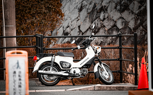 Classic White Honda Motorcycle Parked Outdoor from Chrome web store to be run with OffiDocs Chromium online Classic White Honda Motorcycle Parked Outdoor from Chrome web store to be run with OffiDocs Chromium online