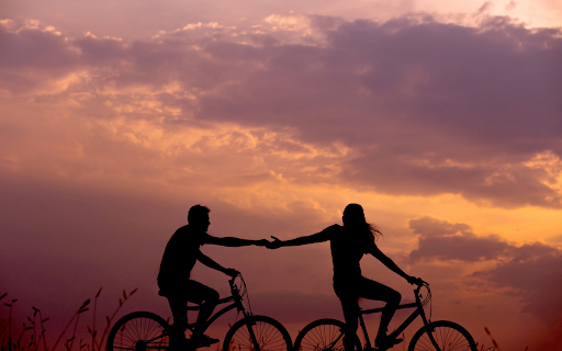 Holding hands while riding a bicycle from Chrome web store to be run with OffiDocs Chromium online Holding hands while riding a bicycle from Chrome web store to be run with OffiDocs Chromium online