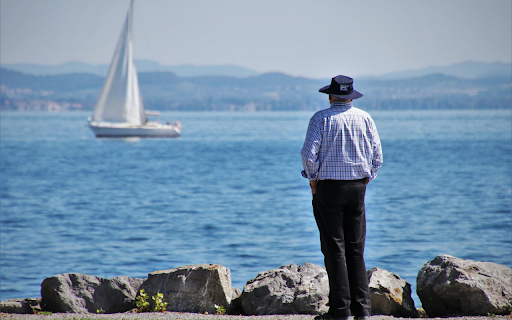 Men looking at boats from Chrome web store to be run with OffiDocs Chromium online Men looking at boats from Chrome web store to be run with OffiDocs Chromium online