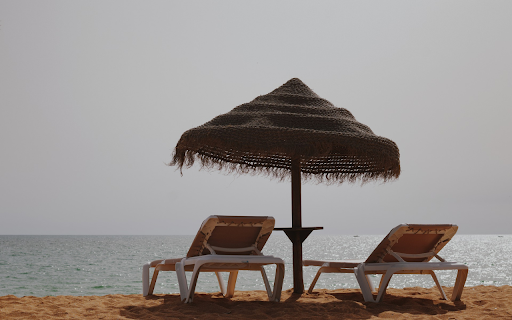 Tasseled umbrella on the beach from Chrome web store to be run with OffiDocs Chromium online Tasseled umbrella on the beach from Chrome web store to be run with OffiDocs Chromium online