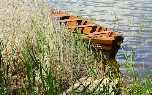 Wooden boat by the river from Chrome web store to be run with OffiDocs Chromium online Wooden boat by the river from Chrome web store to be run with OffiDocs Chromium online