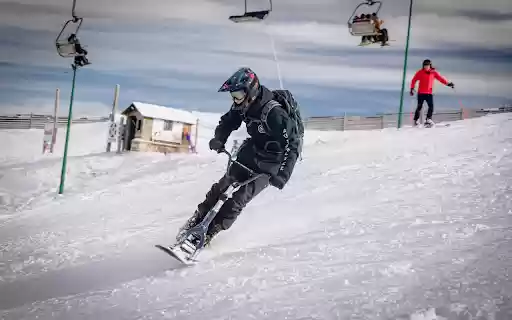 Snowmobile and Man from Chrome web store to be run with OffiDocs Chromium online Snowmobile and Man from Chrome web store to be run with OffiDocs Chromium online